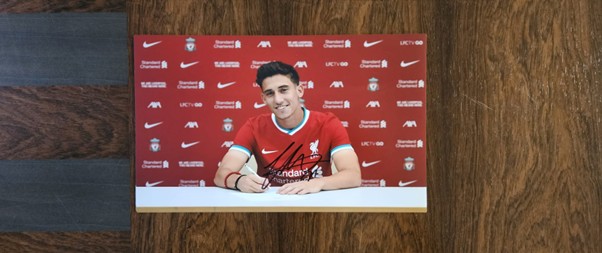 7.kostas tsimikas x 8 signed
