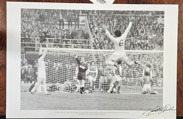 Norman ‘Bite Yer Legs Hunter leaps for joy as Allan Clarke scores the goal that secured Leeds first F.A Cup victory. 1